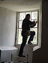 Christoph repairing the west loft window in the East Church, Cromarty